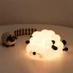 Veilleuse LED tactile animal mignon en silicone rechargeable.