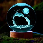 Boule de cristal de lune de dauphin 3D